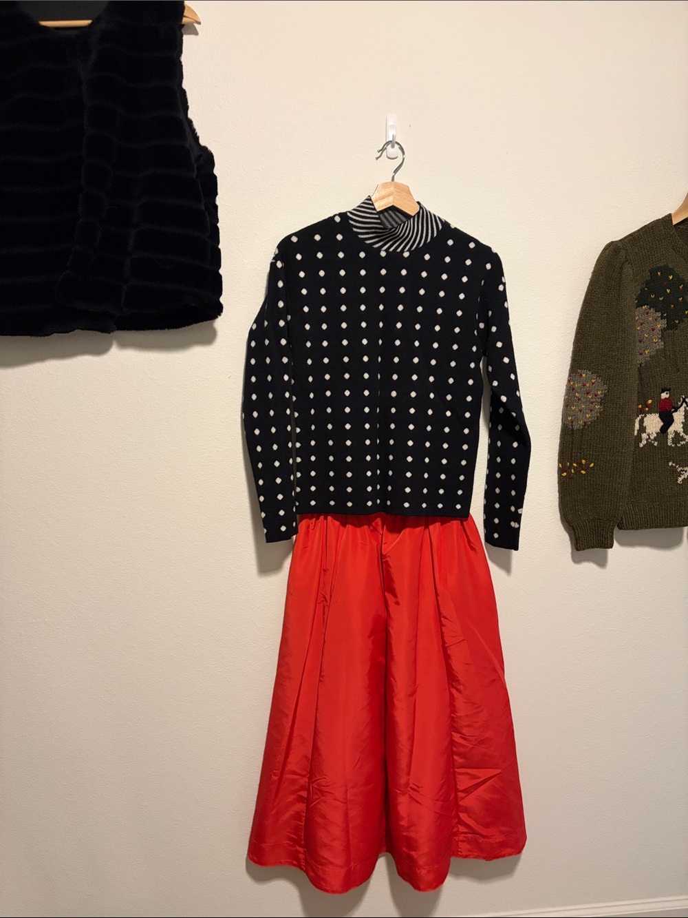Reversible mock neck sweater with polka dots and stripes